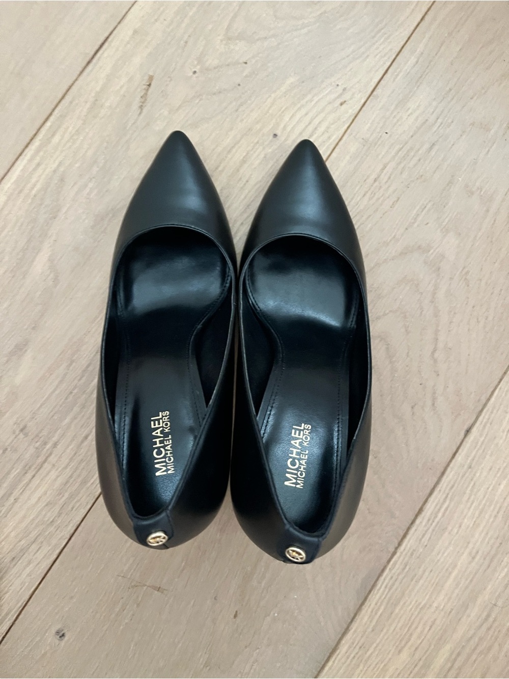 Michael Kors Milly Flex Pump - Black Pointed Toe Pumps with Gold Logo Accent